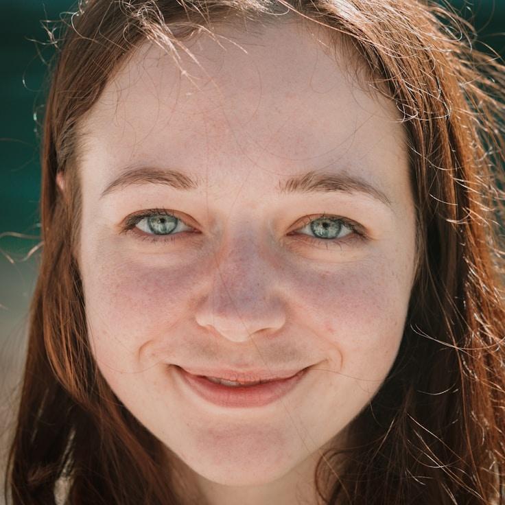 Kaveri Mehta, Lead Design Curator at Plateau Rustic Crest, reviewing corporate floral arrangements